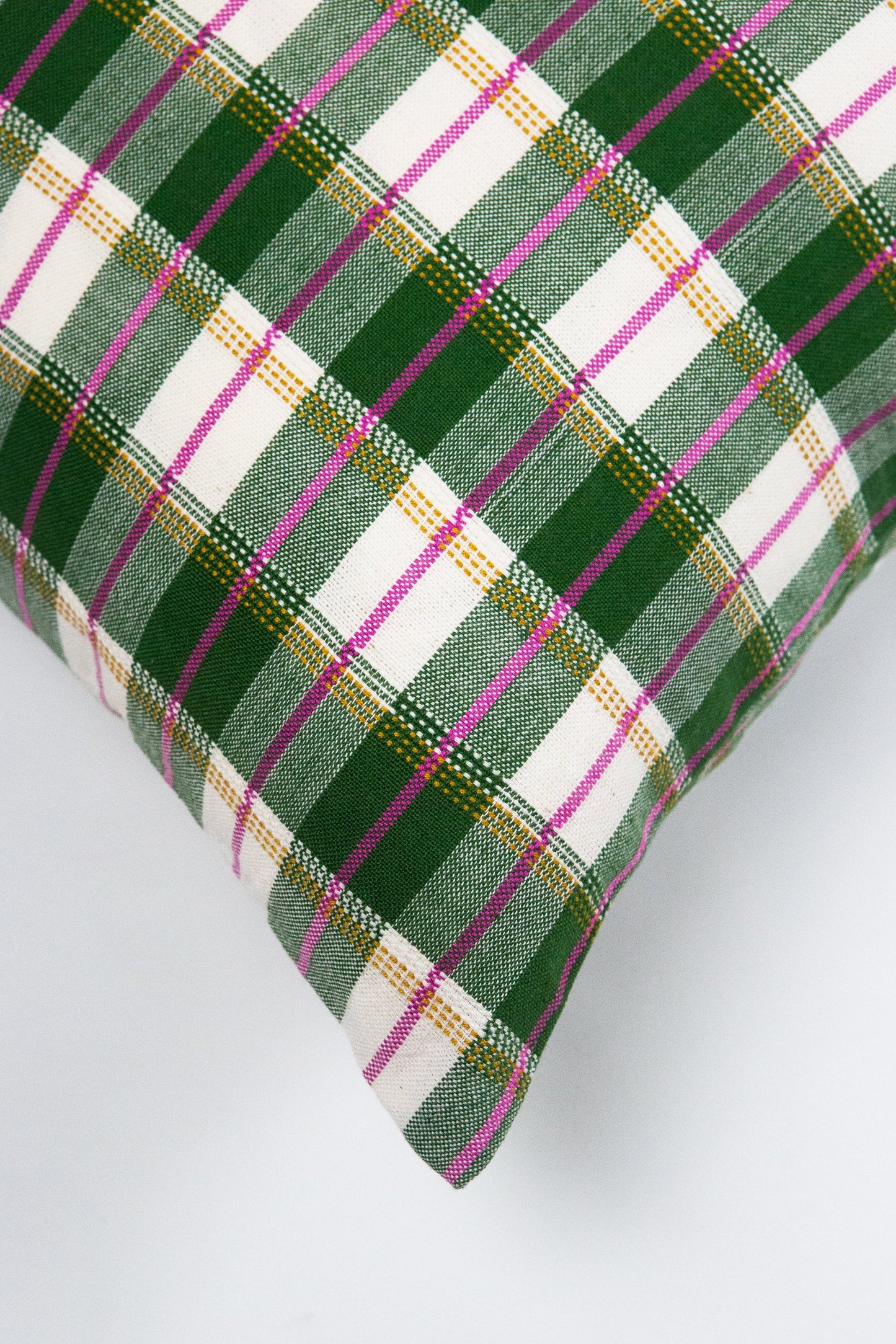 Green gingham woven pillow cover with magenta, gold, and cream diagonal stripes and textured cotton blend fabric