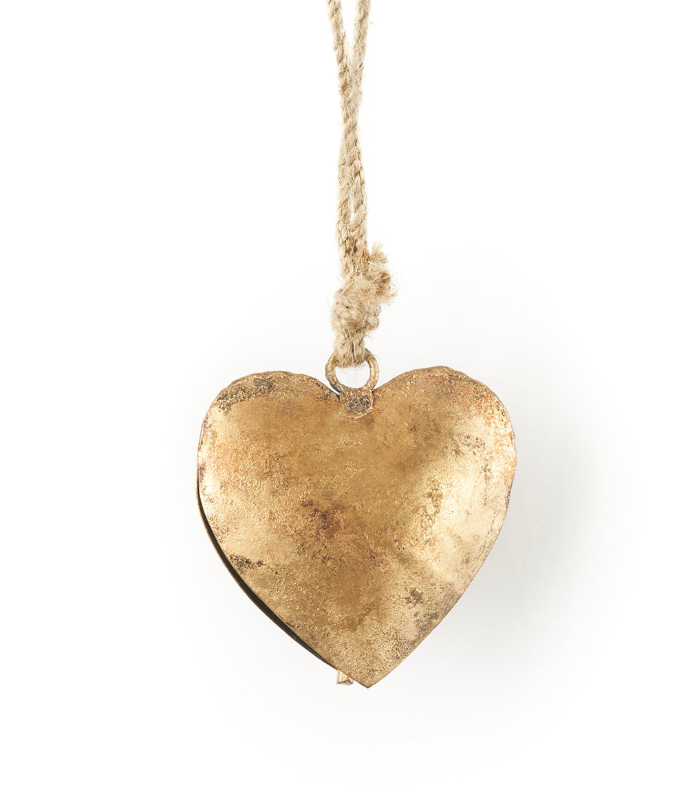 Rustic brass heart-shaped wind chime with jute twine hanging, textured gold metal finish and bell ornament