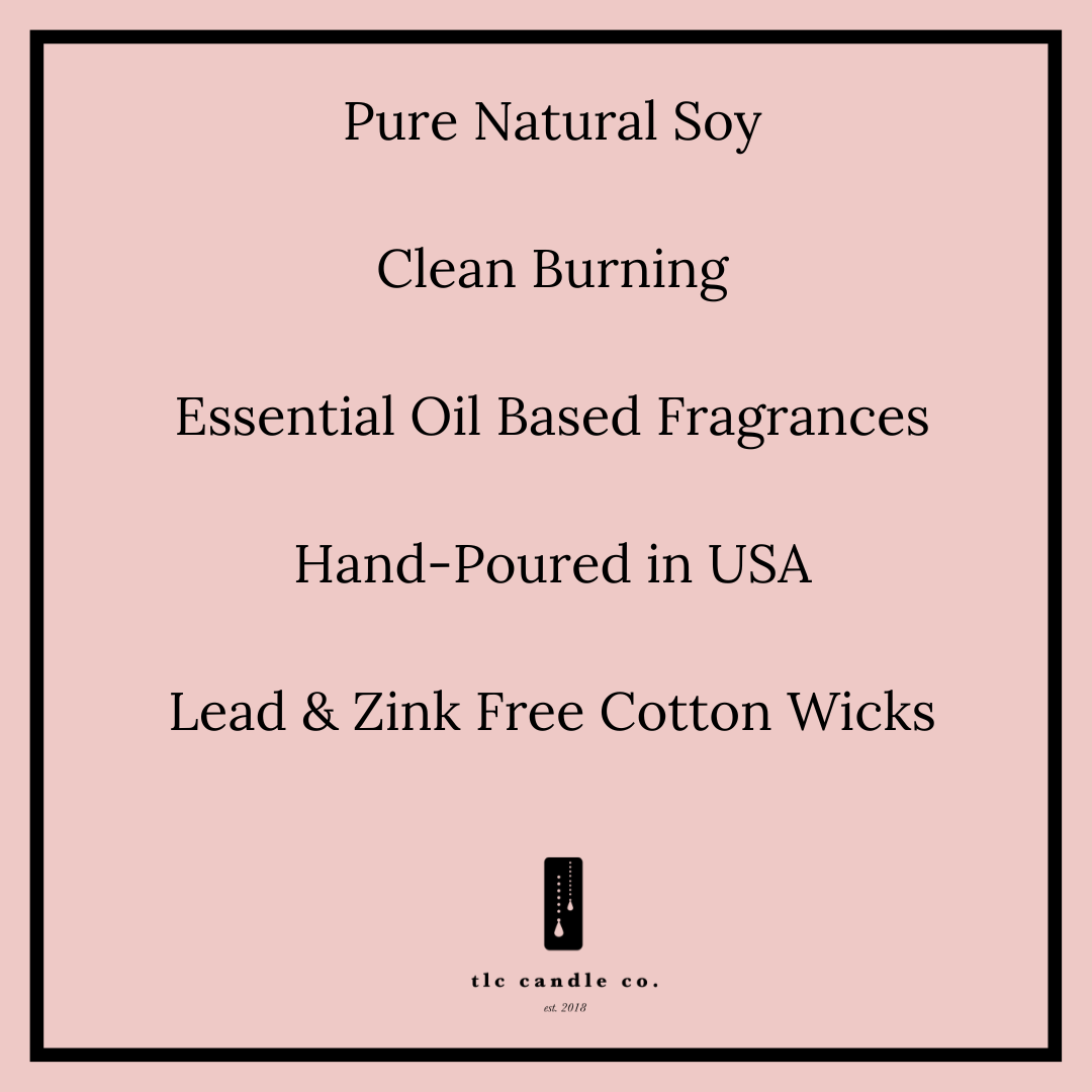 Blush pink soy candle label with black border featuring essential oil-based fragrance and cotton wick details