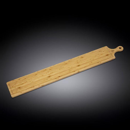 Long bamboo charcuterie board with handle, natural wood grain texture, sustainable kitchen serving piece