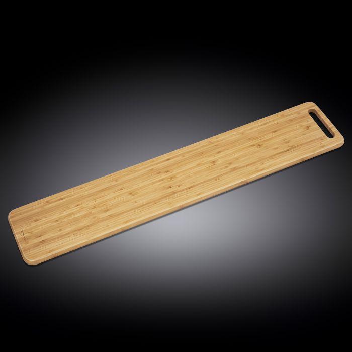 Bamboo charcuterie board with natural wood grain finish and rounded handle cutout, long rectangular serving platter design