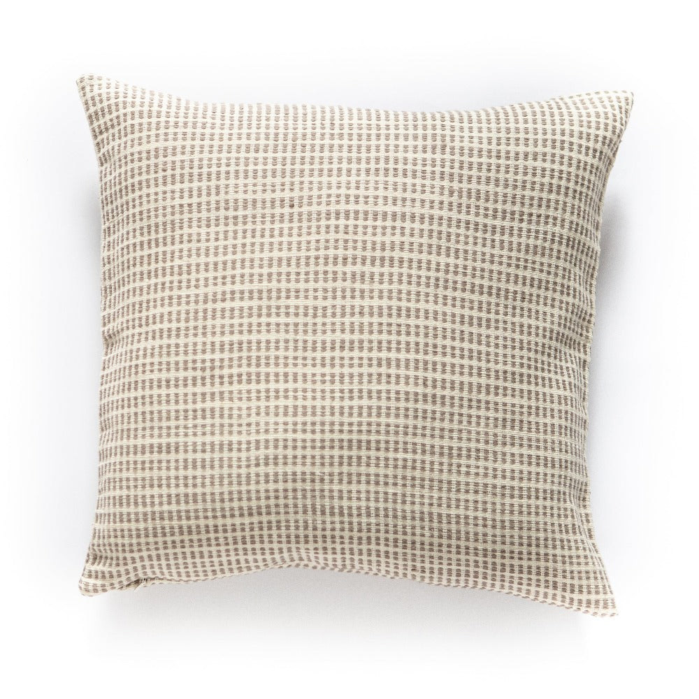 Beige and cream textured pillow cover with waffle weave pattern and sustainable natural fiber construction