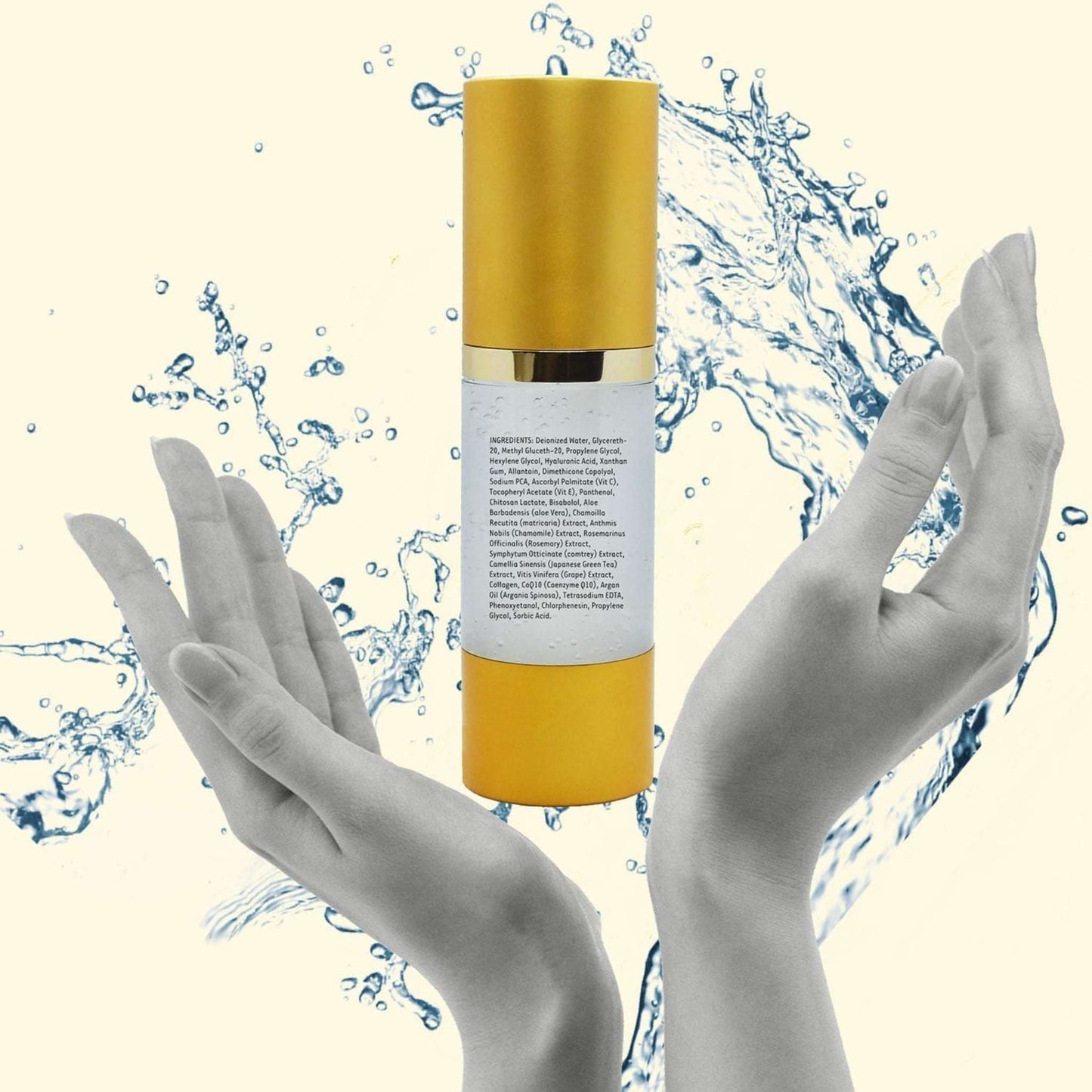 Gold and white cylindrical anti-aging facial serum bottle with brass band, held by hands in water splash