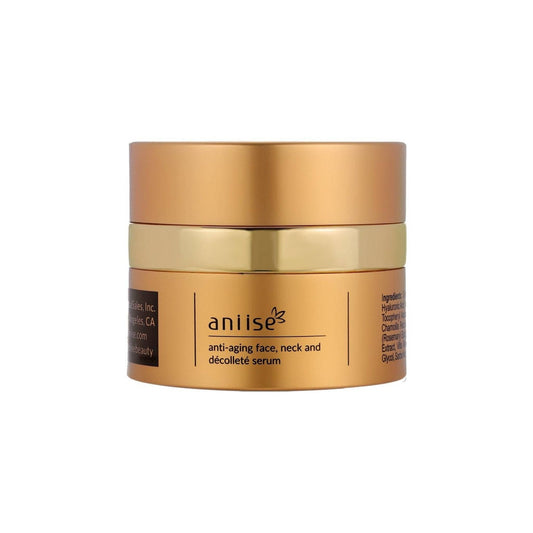 Gold cylindrical skincare jar with tiered metallic bands, anti-aging face and neck serum in luxe packaging