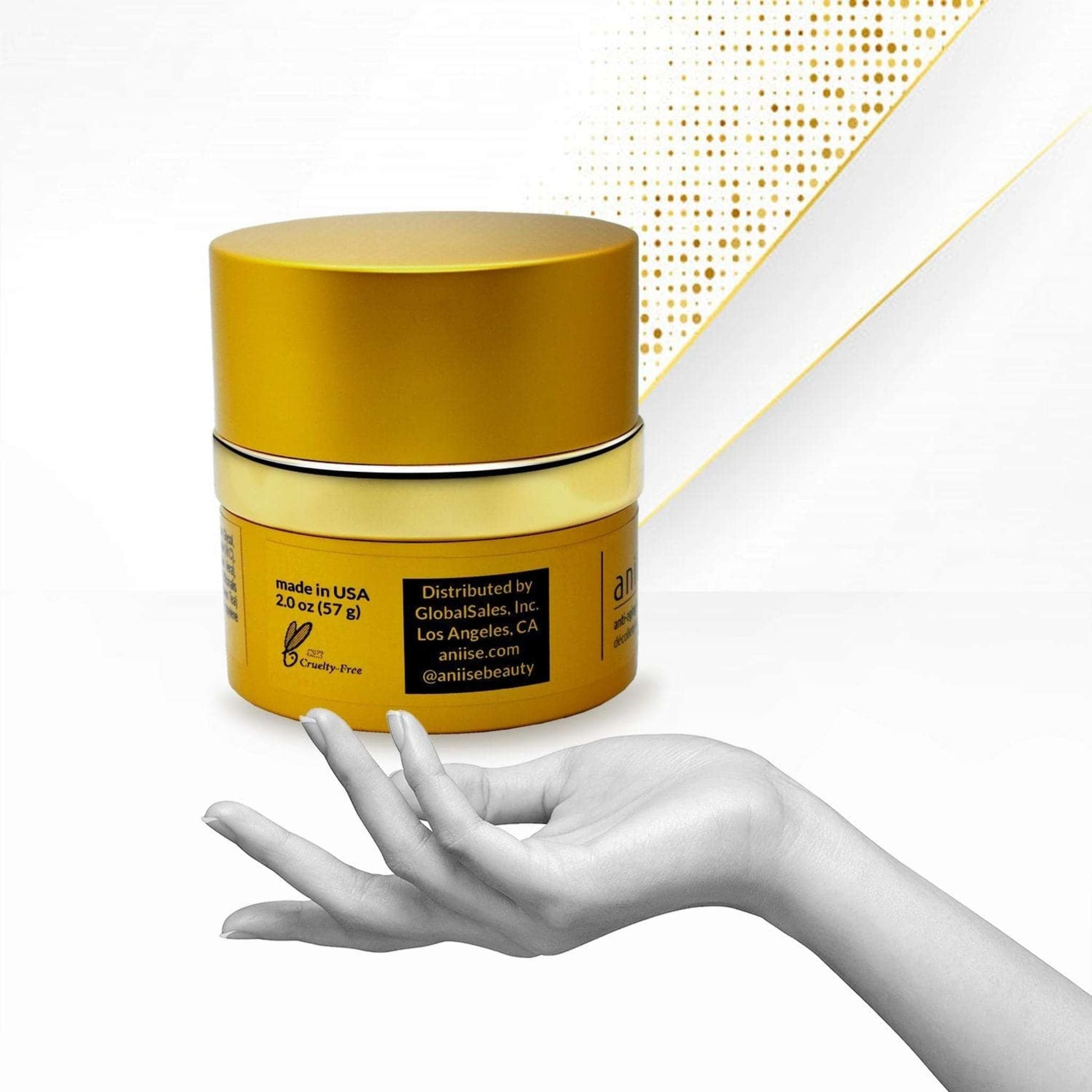 Golden cylindrical face serum jar with cream band, anti-aging skincare product in sustainable packaging