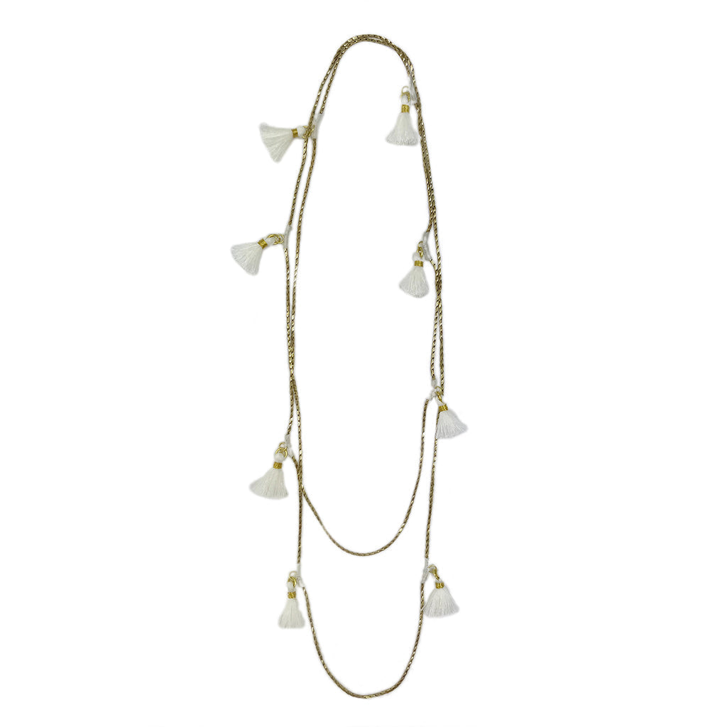 Layered tassel necklace with cream silk tassels and gold-tone cord strands