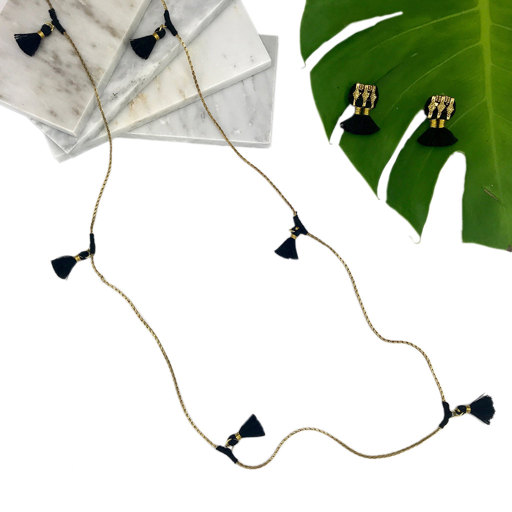 Ananya tassel necklace with black silk tassels and brass chain, paired with matching drop earrings